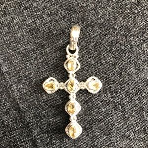 Silver cross with bezel set stones